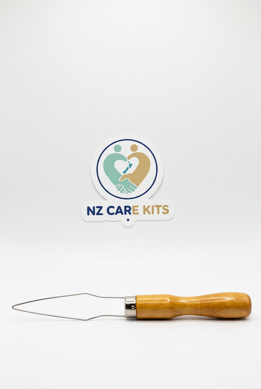 Button fastener with wooden handle and metal wire loop on a white background