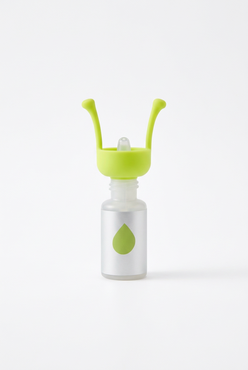 Green eye drop dispenser attached to a white bottle on a white background