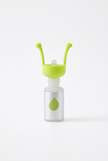 Green eye drop dispenser attached to a white bottle on a white background
