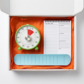 Time Buddy Kit visual timer, blue task wristband and to-do memo pad arranged in a white gift box with orange tissue