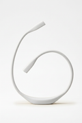 White flexible neck light in an upright position on a white background
