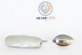 Grip tool fitted to a metal spoon on a white background